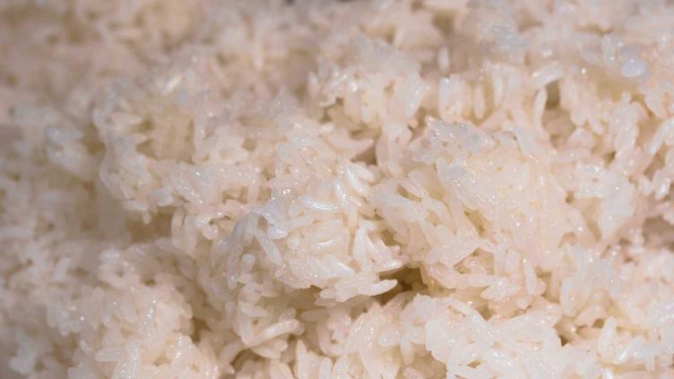 How to Cook Sticky Rice - Best Methods Compared Photo of wet and sticky rice all clumped from boiling and then steaming - the worst method