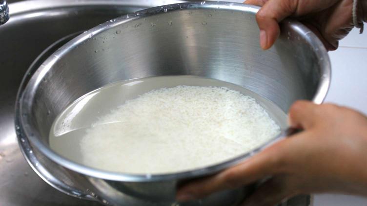 Photo of finishing up washing rice with water only a little biut cloudy