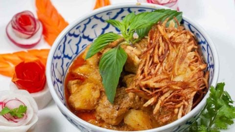 Quick & Easy Authentic Thai Chicken Massaman Curry Recipe - Massaman Gai Photo of Thai Massaman Gai with potato nests and decorations