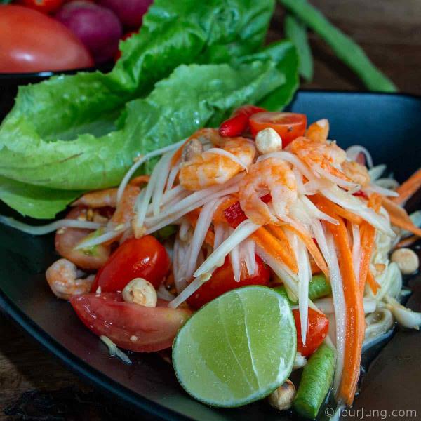 Som Tam Thai - Thai Papaya Salad (Spicy) Photo of Som Tam Thai or Green Papaya Salad - it is very healthy and tasty