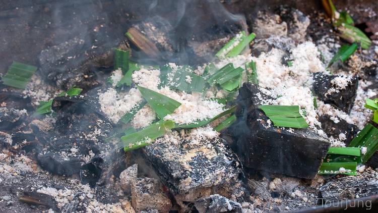 photo of dried coconut and pandanus leaves used to create smoke on the BBQ