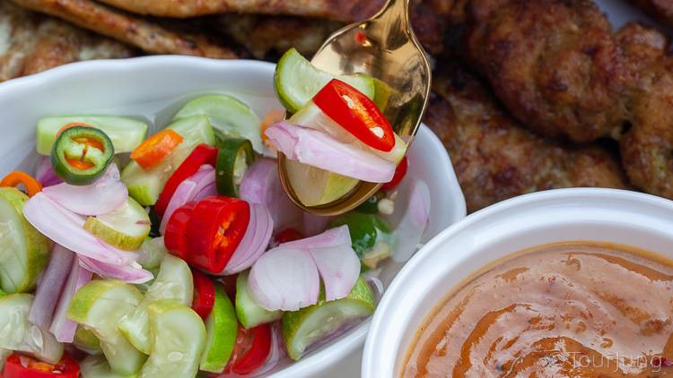 Awesome Thai Chicken Satay Skewers with Peanut Sauce Recipe - BBQ & Air Fryer Cooked Thai Street Food photo of sweet Thai pickes and gold spoon