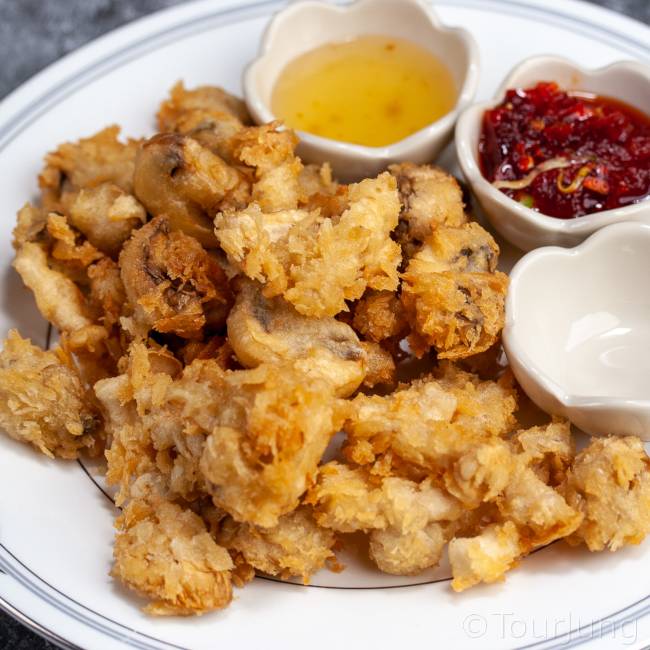 Fried Mushrooms with Sweet Chili Dipping Sauce photo of crispy crunchy breadcrumbed fried mushrooms