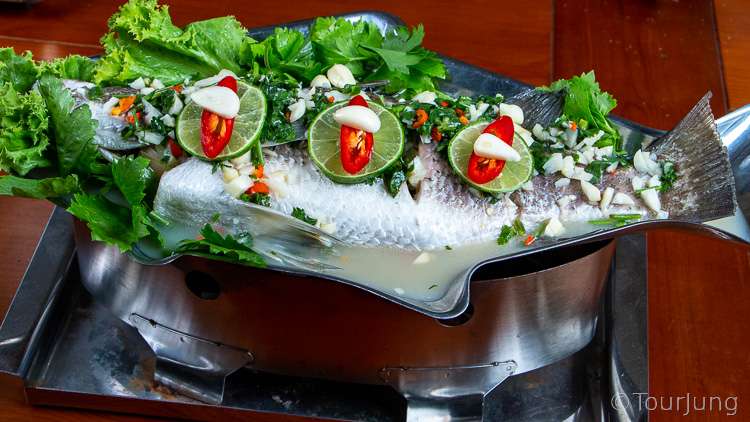 Awesome Thai Steamed Fish with Lime Sauce Recipe - Pla Krapong Neung Manao photo of Pla Krapong Neung Manao as typically served