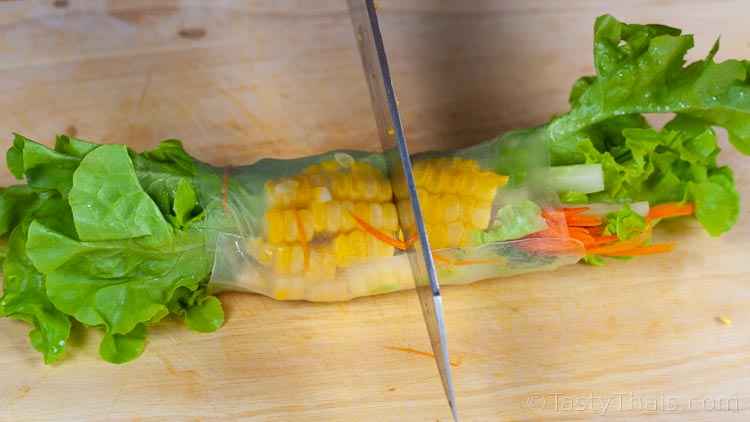 photo of Thai summer rolls being cut for serving