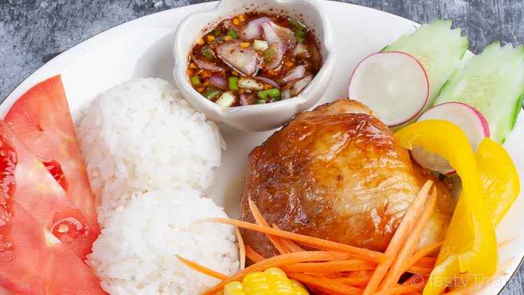 photo of air fryer chicken thighs with thai dipping sauce