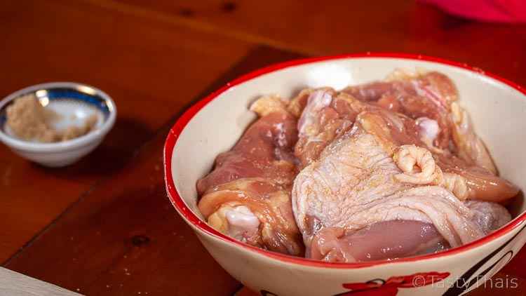 Air Fried Chicken with Easy Thai Dipping Sauce photo of chicken thighs resting after seasoning