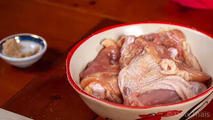 photo of chicken thighs resting after seasoning