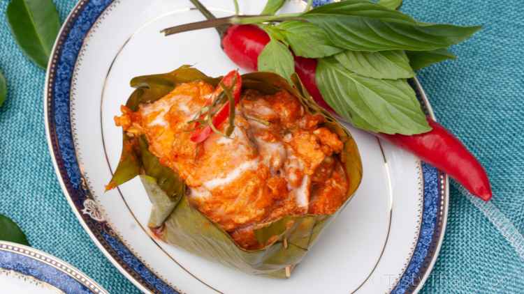 Best Authentic Thai Salmon Curry Recipe - Hor Mok Pla Salmon photo of Thai Red Curry with coconut milk and fresh salmon