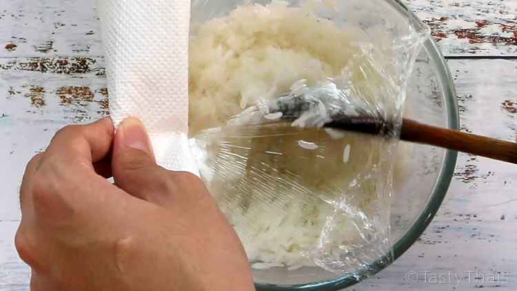 photo of mixing the rice after initial boil of water in the microwave