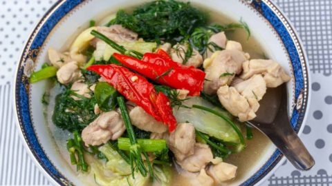 Kaeng Om or Thai clear soup cooked with chicken and herbs