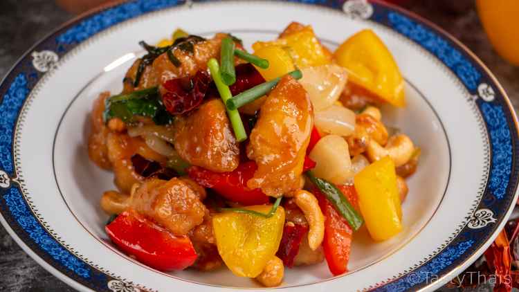 Best Thai Chicken Cashew Nut Stir Fry Chicken Cashew Nut Stir Fry Thai Served on a blue & white plate