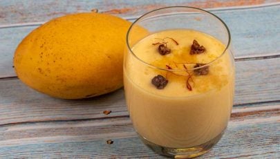 Mango lassi made with fresh mango or mango pulp or canned mango