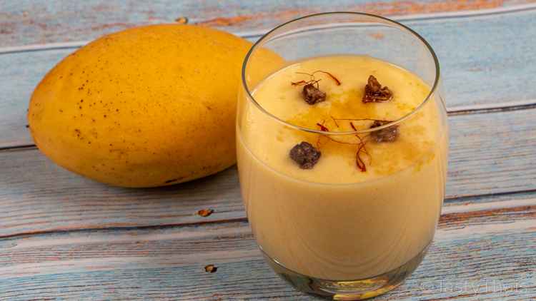 Mango lassi made with fresh mango or mango pulp or canned mango