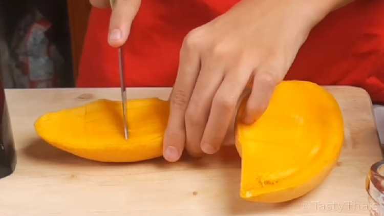 5 Minute Mango Lassi - Thai Mango & Coconut Yogurt Smoothie Easiest way to get the mango flesh out is to slice tehn score and scoop