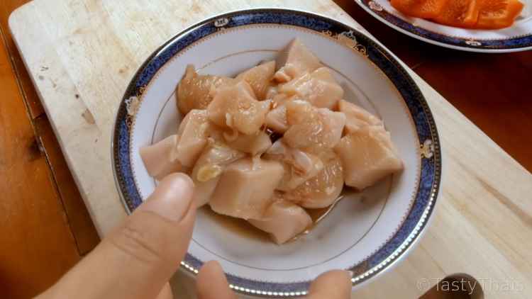 Marinating the chicken before flouring and crispy frying the outside