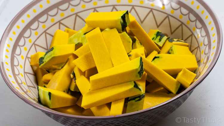 cut pumpkin retainign a little skin on for Thai coconut chicken curry with pumpkin