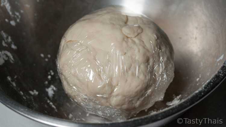 Making Gyoza wrappers, Pork Fillings & Frying Gyoza Dumplings Wrap the dough to rest for a while