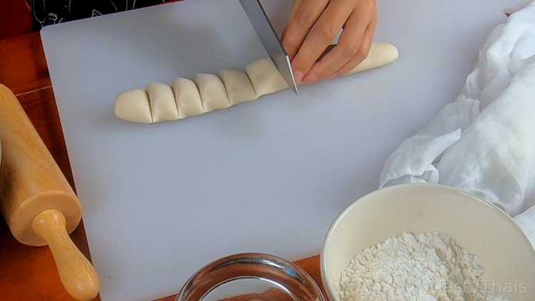 Making Gyoza wrappers, Pork Fillings & Frying Gyoza Dumplings Cutting the dough into wrapper amounts