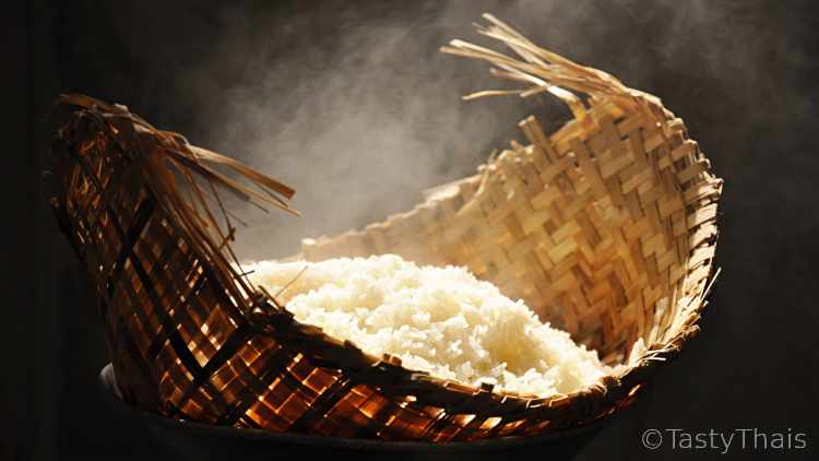 Thai wonderful sticky rice steaming in a bamboo steamer