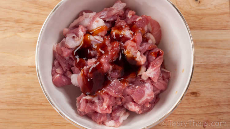 Authentic Pad See Ew Recipe - Thai Stir Fried Dark Soy Sauce Noodle Dish Fist step is marinating the pork or other protein