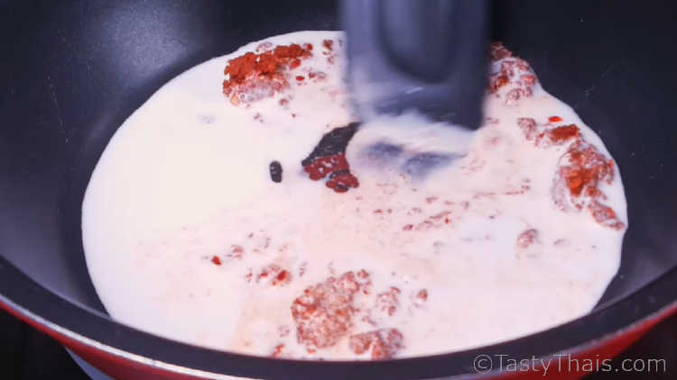 Homemade Thai Red Curry Paste Recipe Red curry paste mixed in coconut milk